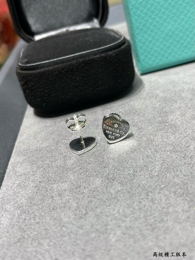 T*f*ny earrings